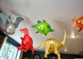 Ingeniosos dinosaurios con globos